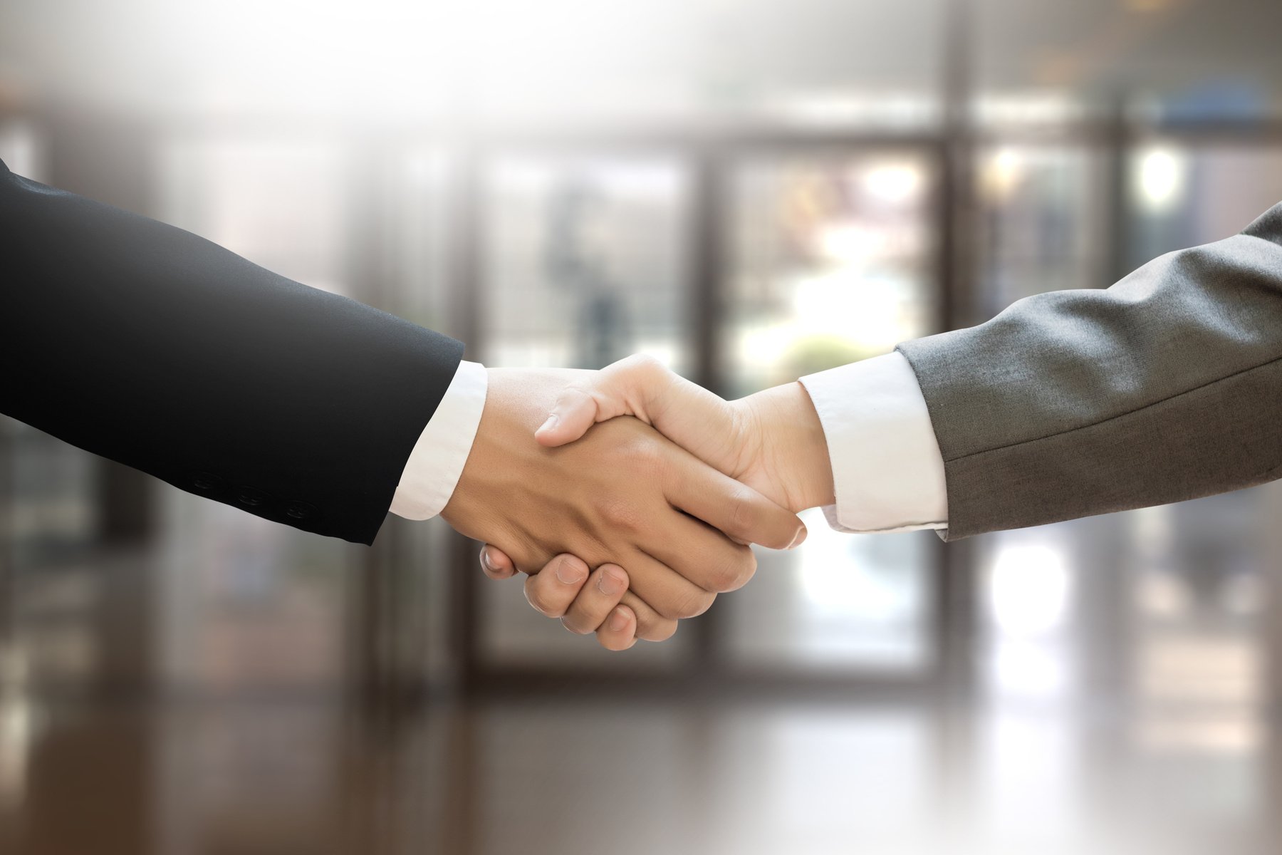 M&A (MERGERS AND ACQUISITIONS) , Businessman handshake working at office M&A